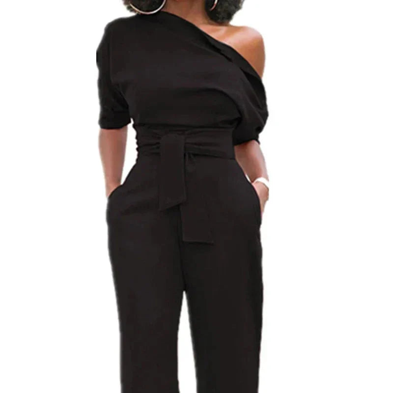Anouk | Jumpsuit met Open Schouder en Strikband