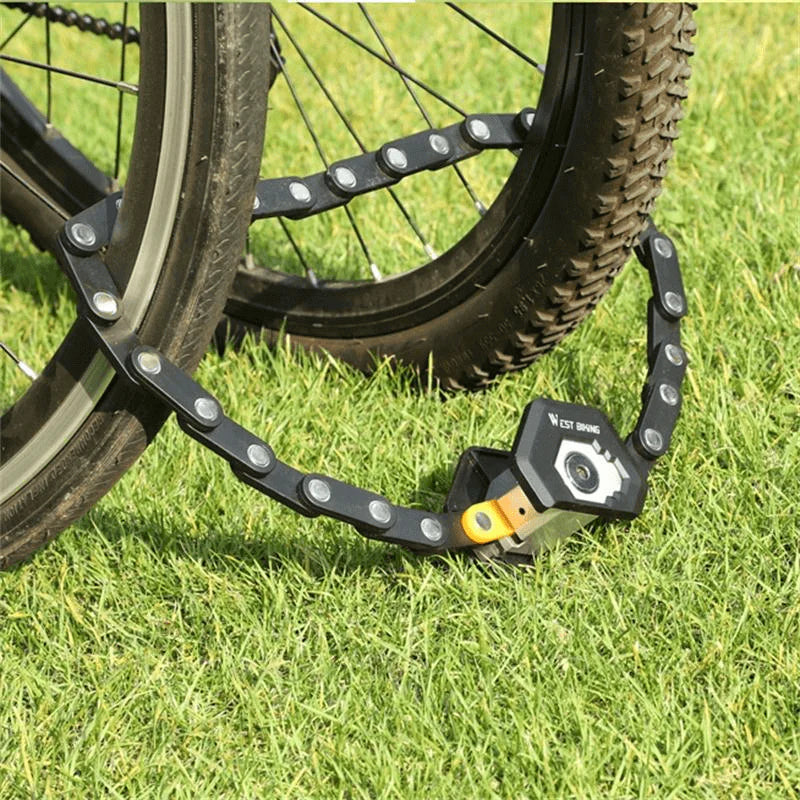 Zwart fietsslot met oranje accent en cilindersluiting geschikt voor alle soorten tweewielers