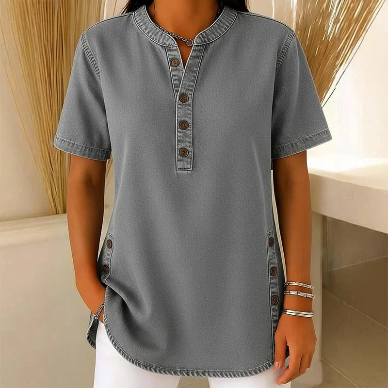 Dames denim tuniek met relaxte pasvorm en afgeronde zoom, gedragen met witte broek