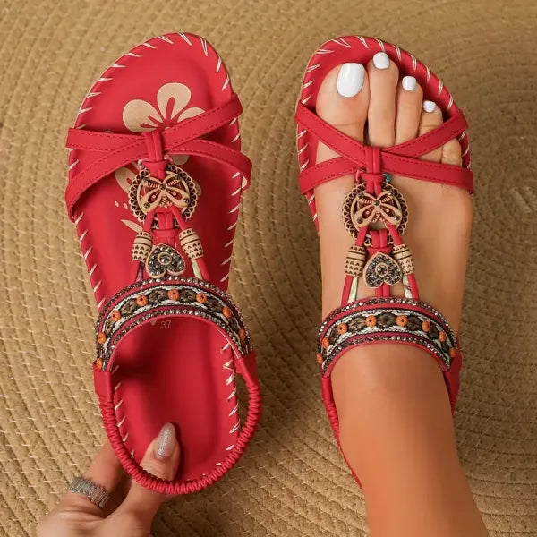Platte dames sandalen met antislip zool en decoratieve kralen