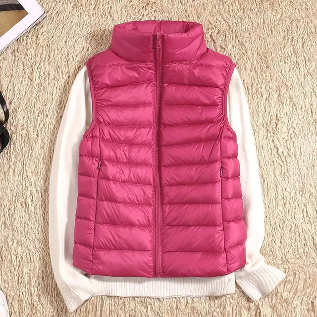 Getailleerde bodywarmer dames met gewatteerde vulling en opstaande kraag combineert warmte met gestroomlijnde look
