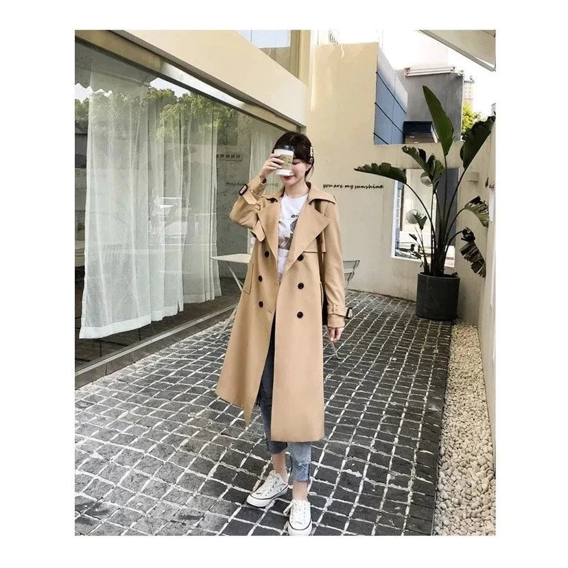 Voorkant van dames trenchcoat met steekzakken en verstelbare tailleceintuur