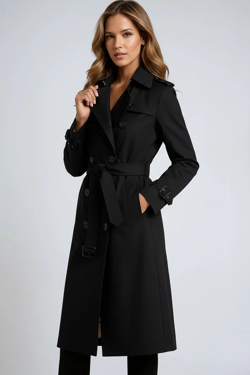 Close-up van double-breasted knoopsluiting en verstelbare manchetten op dames trenchcoat