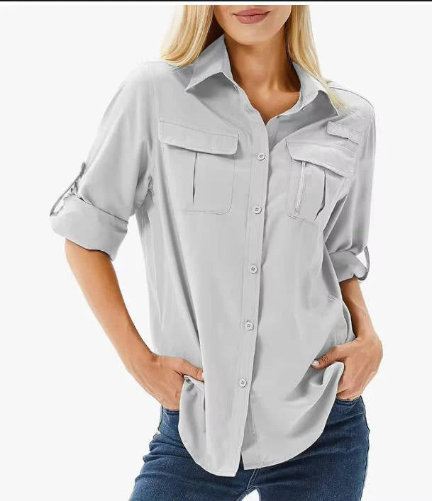 Detail van dames outdoor shirt met oprolbare mouwen en knoopsluiting aan de voorkant