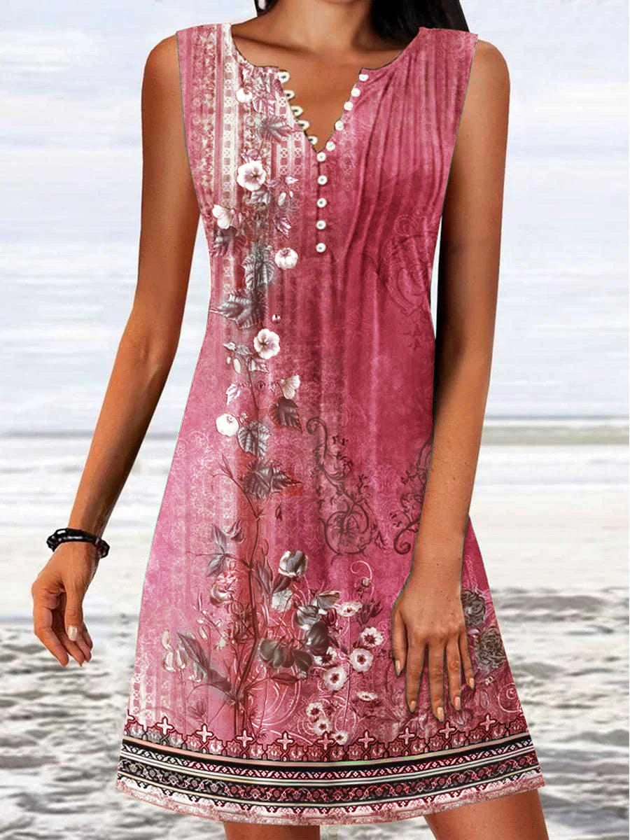 Detail van zomerjurk met bloemenprint, geribde textuur en decoratieve zoom met contrasterende motieven