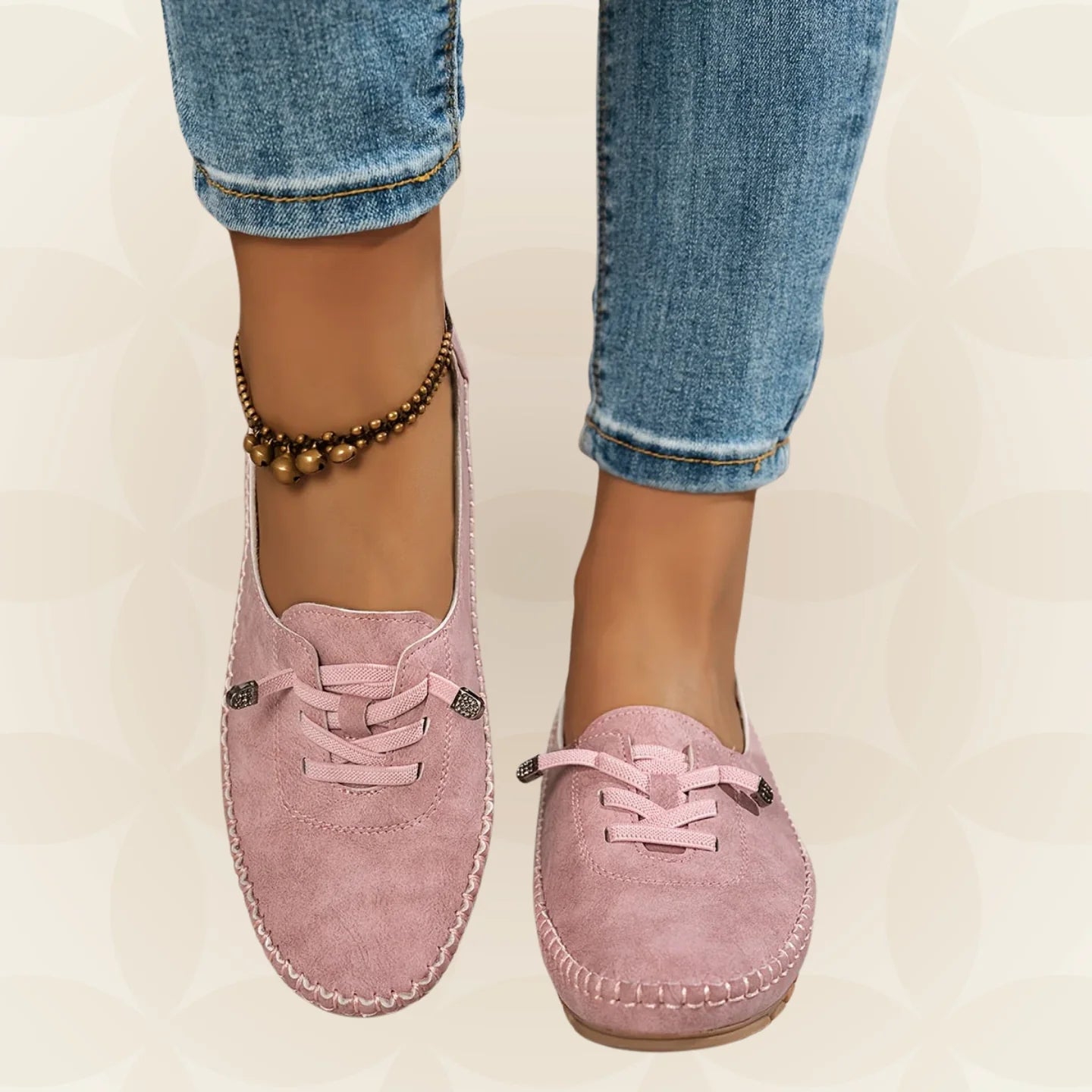 Dames loafers met voetboogondersteuning in roze met vetersluiting en handgenaaide detaillering