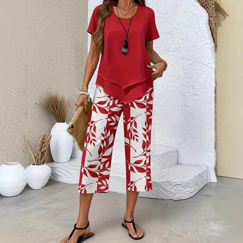 Zomerse dames tweestukken set met moderne asymmetrische snit en geprinte broek