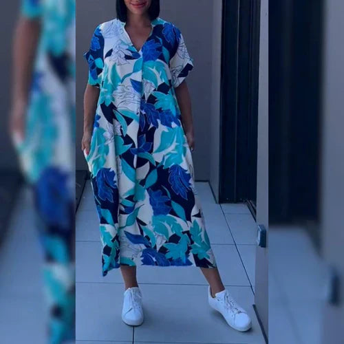 Kaftan midi jurk met V-hals en grafisch print gedragen met witte sneakers voor casual look