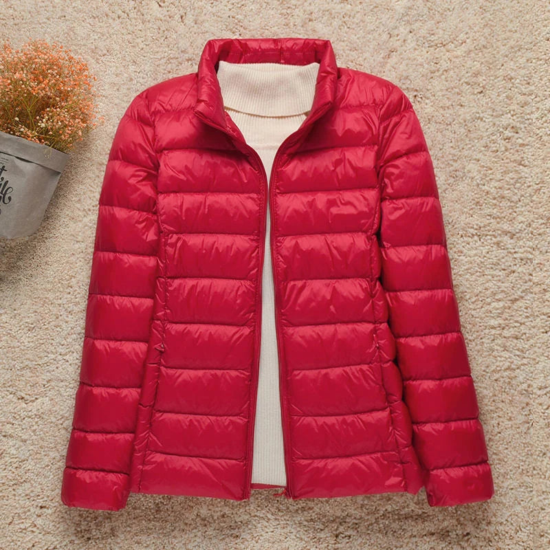Gewatteerde herfstjas met capuchon en ritssluiting, gestroomlijnd silhouet voor dames outerwear