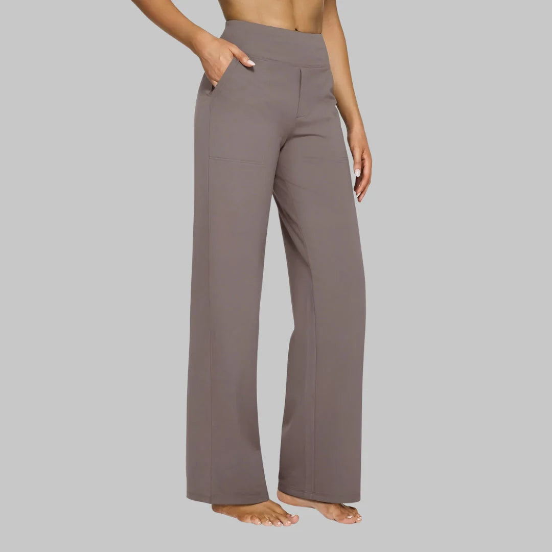 Dames flared stretchbroek hoge taille achterkant met sierzakken en vloeiend silhouet in lichtroze