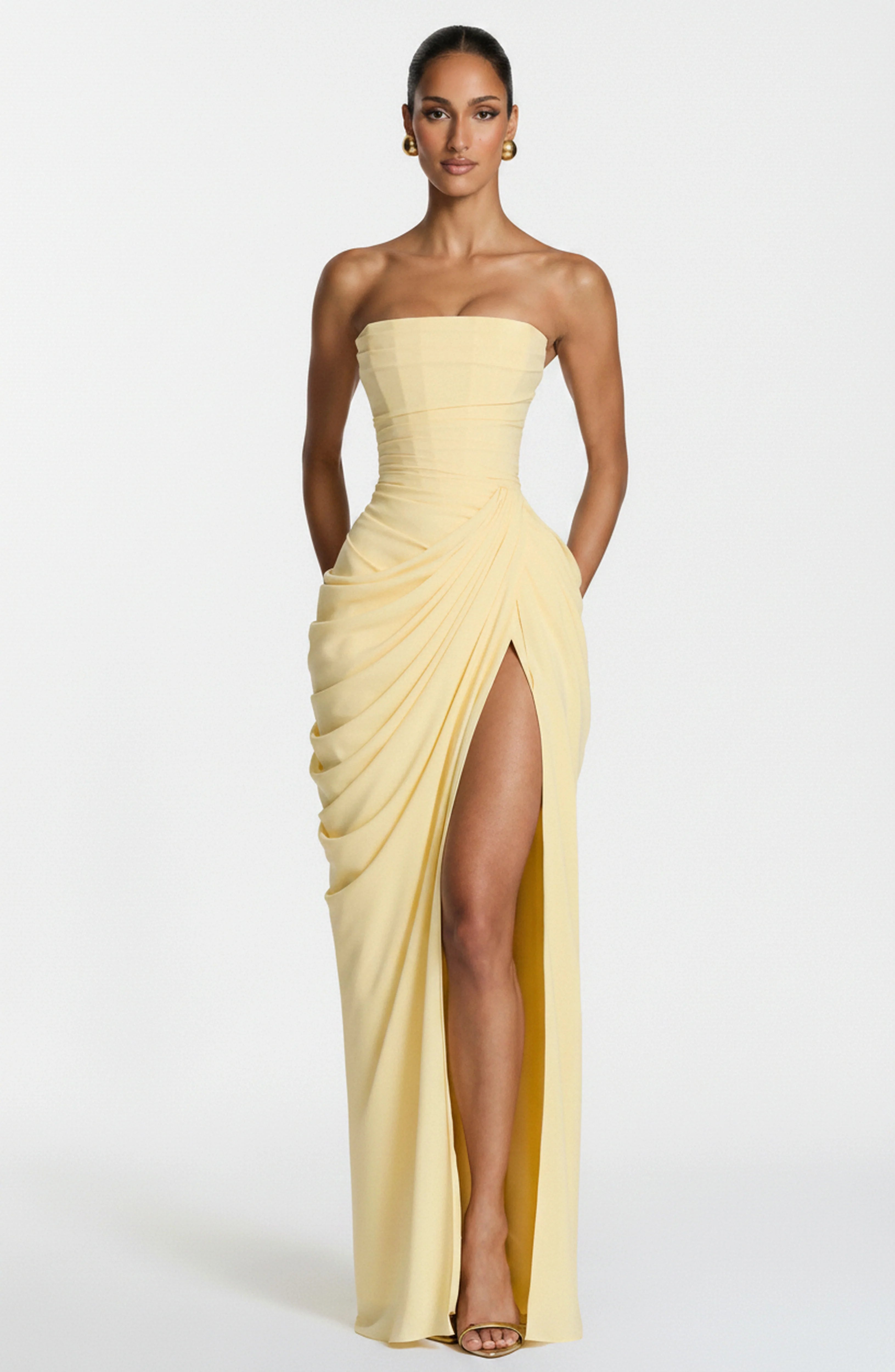 Strapless maxi avondjurk in pastelgeel met gedrapeerde split en corsetbovenstuk voor formele gelegenheden