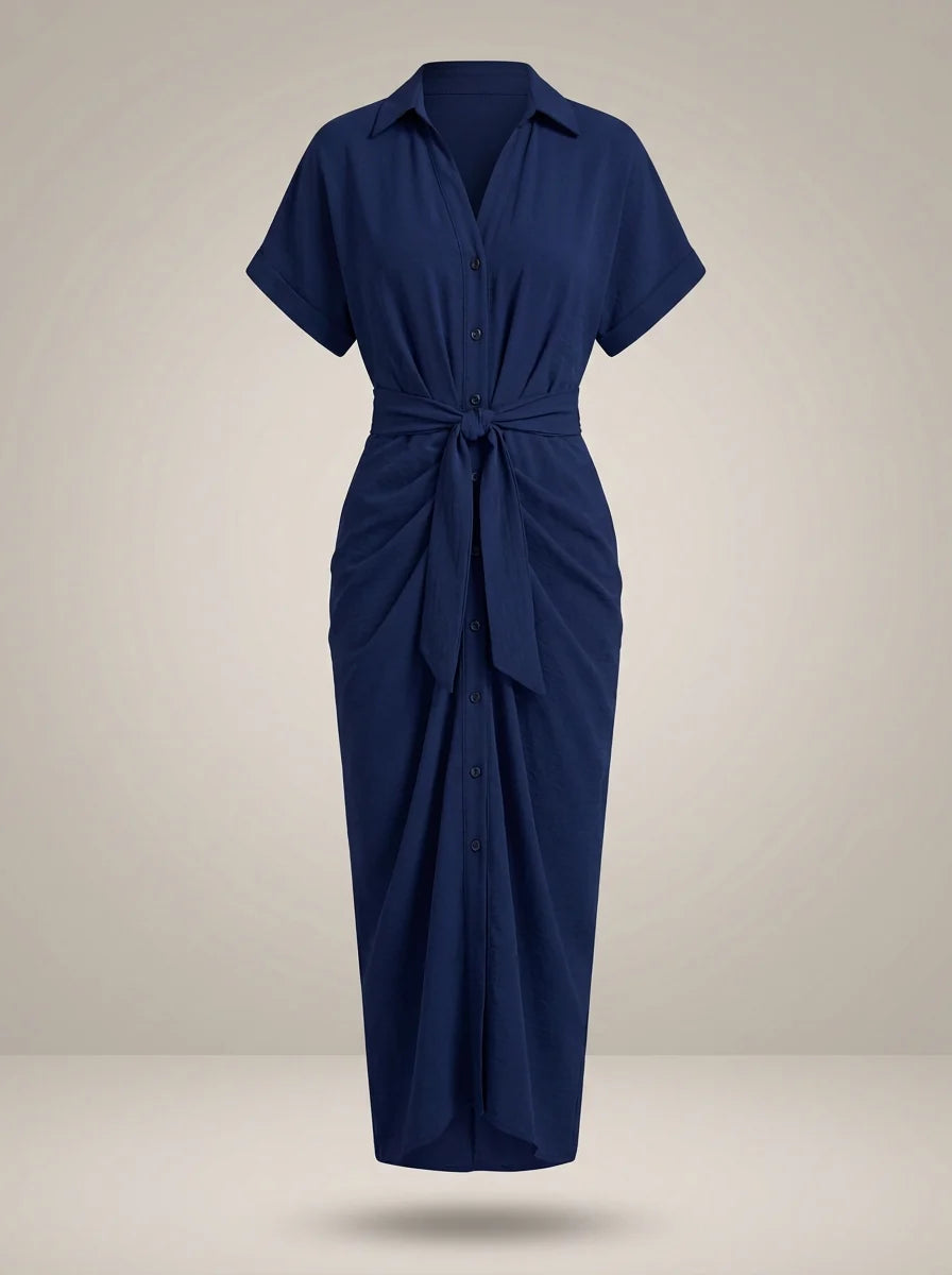 Achterkant detail van midi blousejurk met relaxte pasvorm en lichte stof