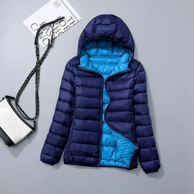 Dames puffer jas met twee steekzakken en comfortabele pasvorm vooraanzicht