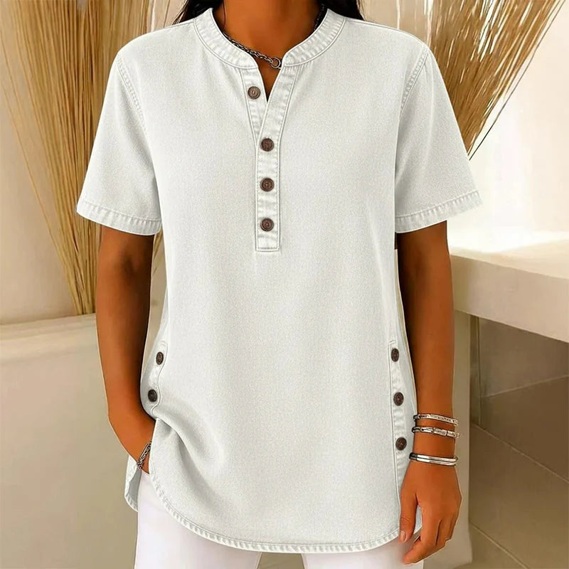 Achterkant van dames denim tuniek met afgeronde zoom en ruime snit