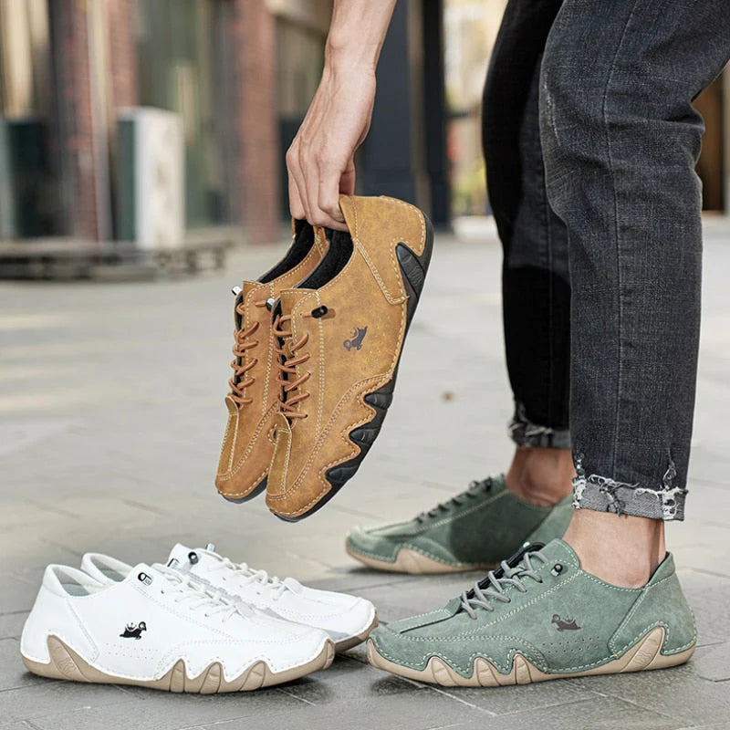 Zijaanzicht van witte barefoot sneakers met ribbel-profiel op de zool