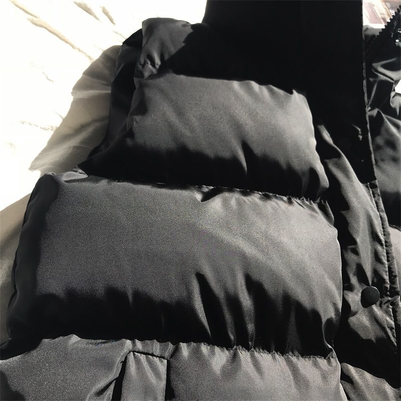Gevoerd mouwloos jack met praktische zakken en windproof stof voor koelere dagen