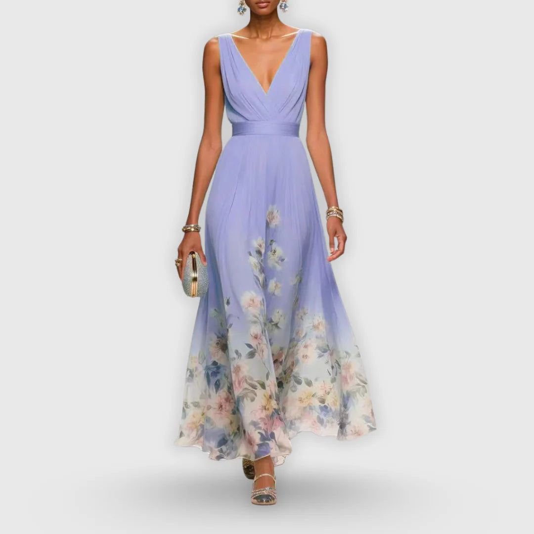 Volledige lengte weergave van de bloemen maxi jurk met verlopende print van blauw naar pastel aan de zoom