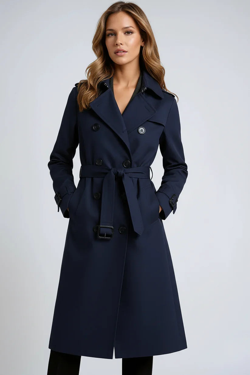 Achterkant van lange trenchcoat met rugstormflap en verstelbare manchetten in beige kleur