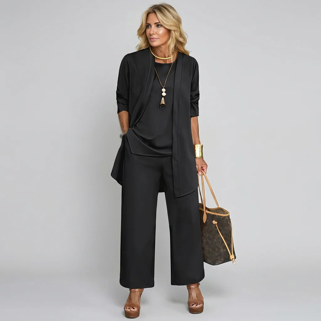 Elegante driedelige set broekpak voor dames in zwart met lang vest, top en wijde broek