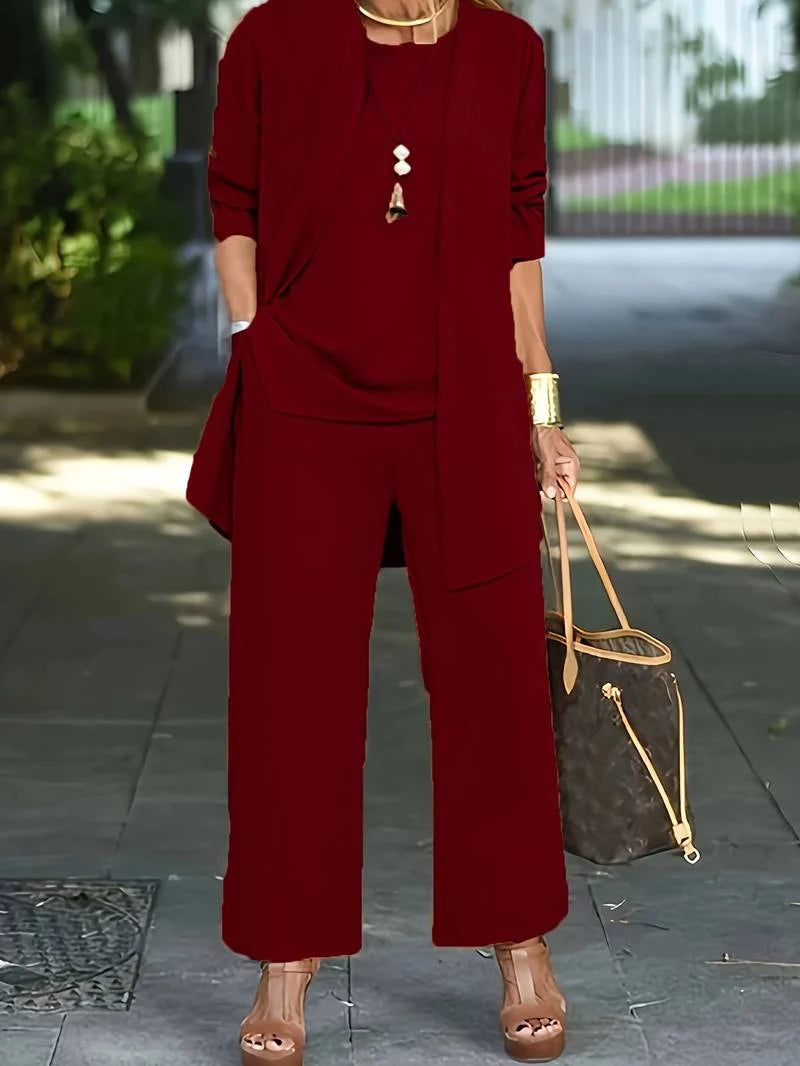 Zwarte driedelige outfit met vest, top en broek voor casual en formele gelegenheden