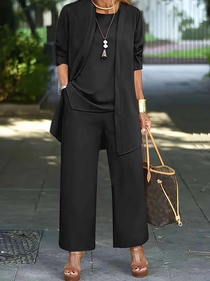 Elegante zwarte broekpak set voor dames met losjes vallend vest en bijpassende broek