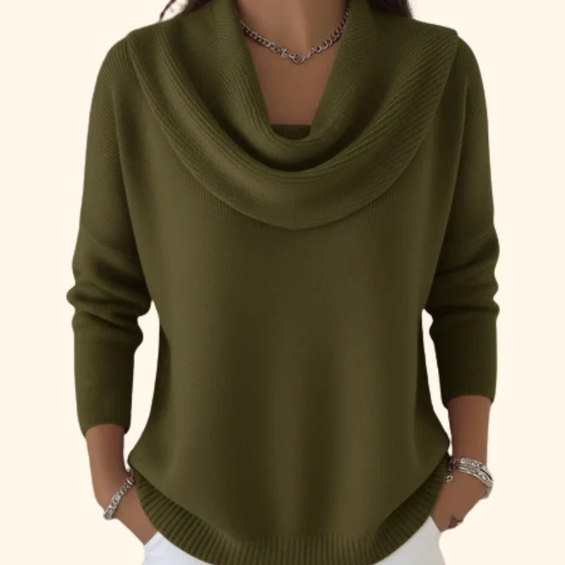 Vrouw draagt rode trui met kraag gecombineerd met witte broek voor casual elegante look