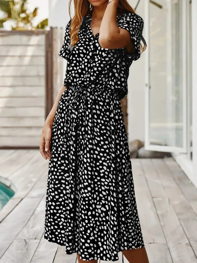 Midi zomerjurk met bindceintuur en relaxed fit silhouet