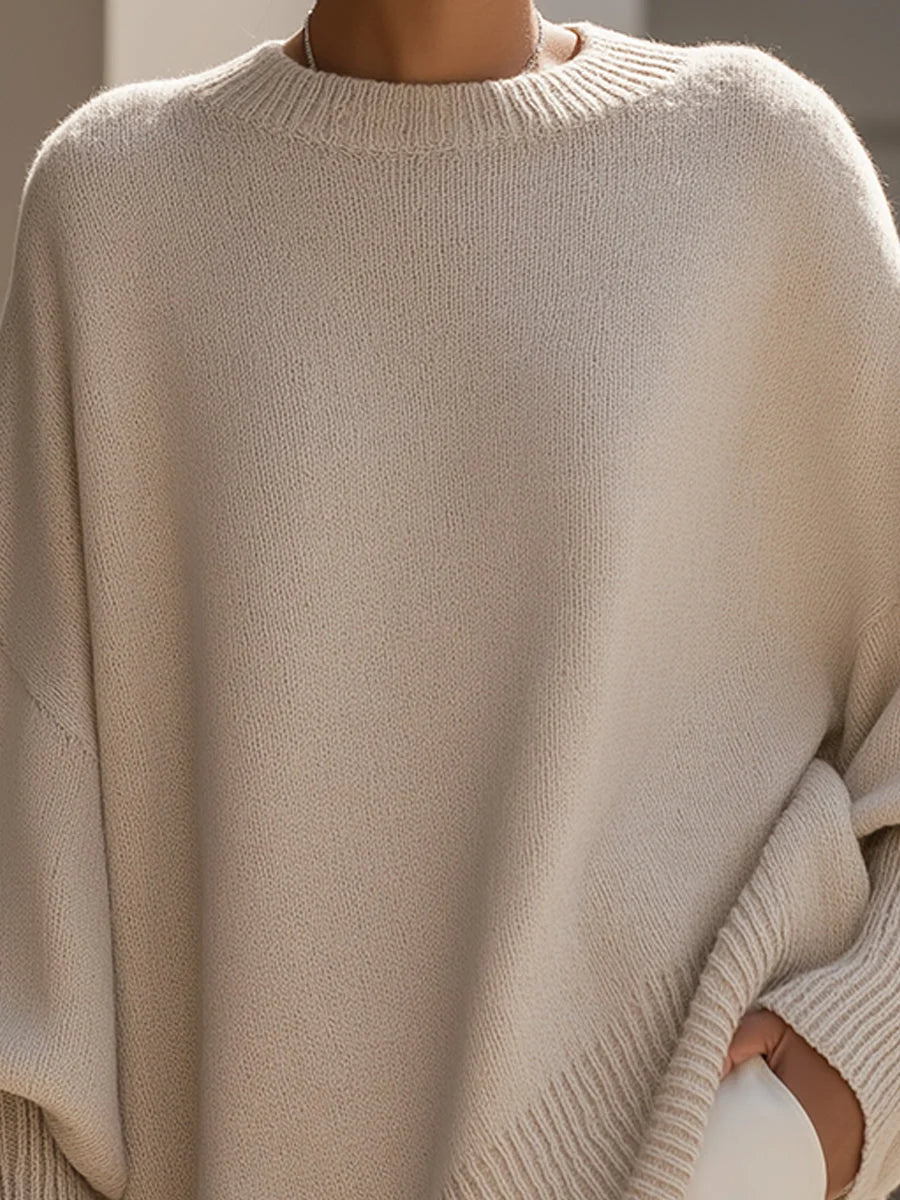 Zijaanzicht van de Elegante Casual-Pullover met asymmetrisch ontwerp en verlengde zijkanten