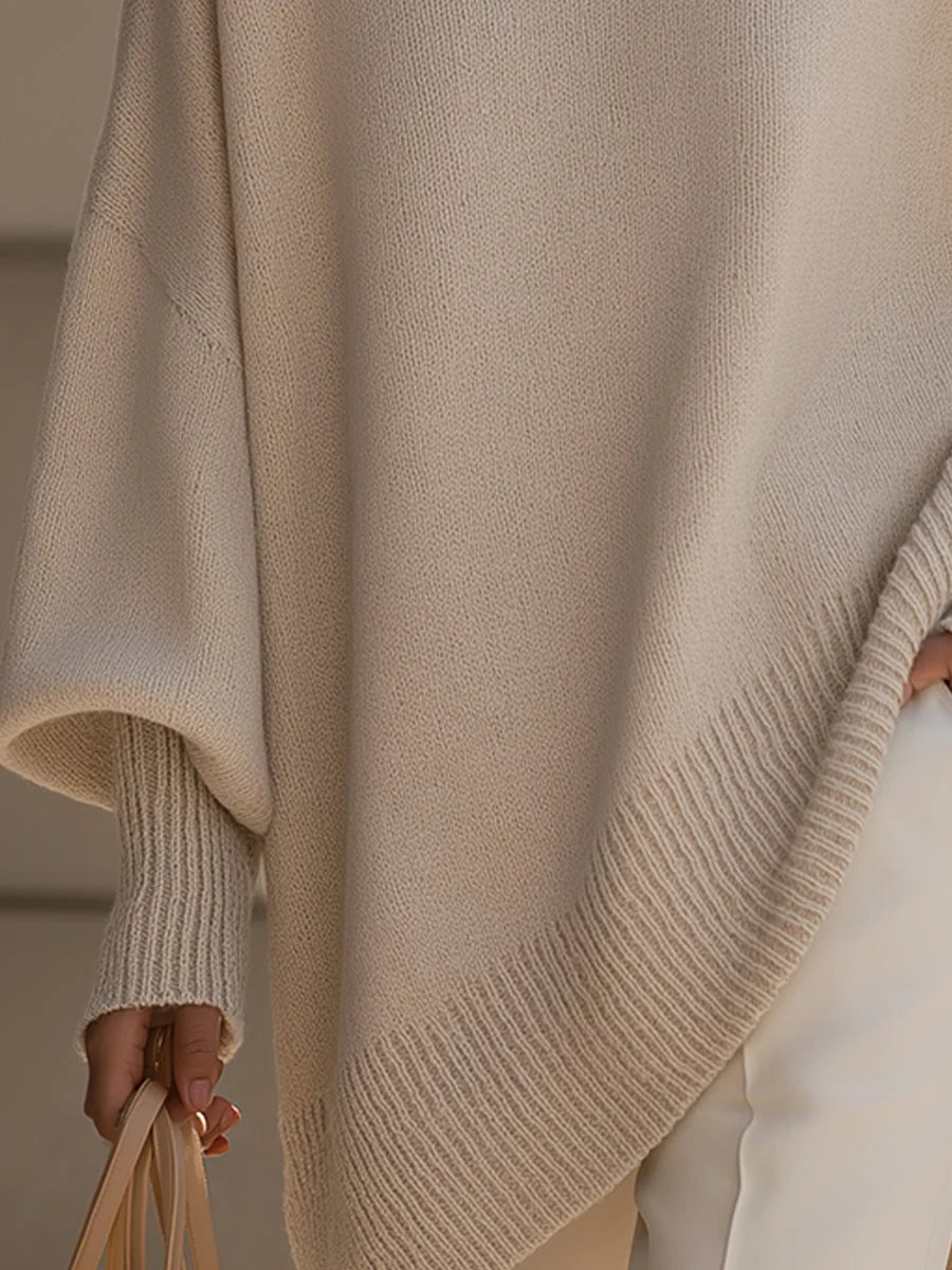 Close-up van de zachte gebreide textuur en geribbelde manchetten van de pullover