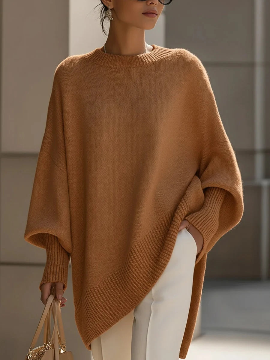 Model toont de bewegingsvrijheid en comfortabele stretch van de gebreide pullover