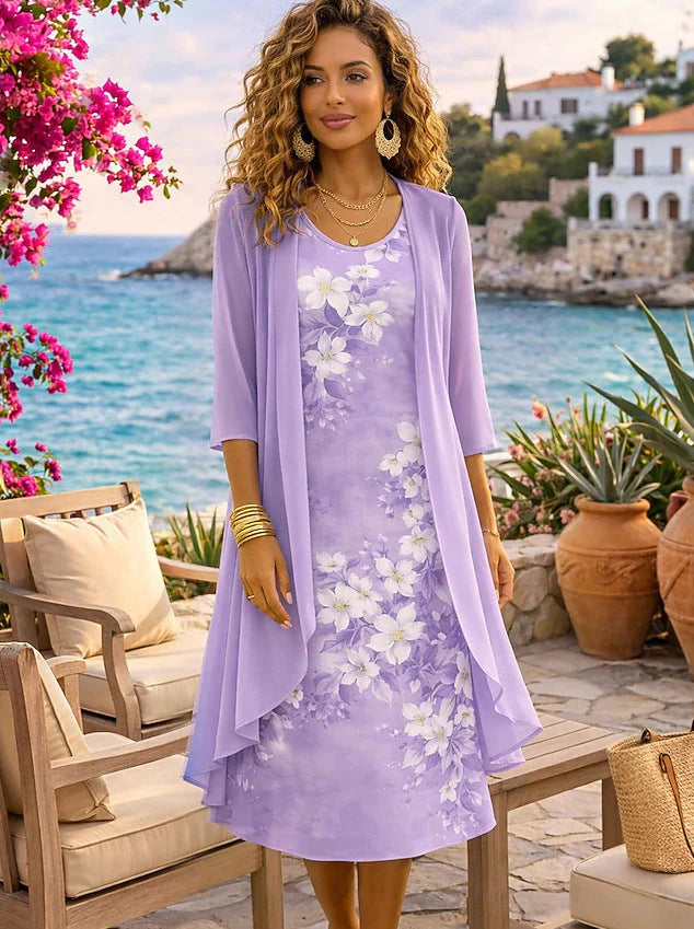 Vakantie jurk set met bloemenprint midi jurk en lichte open cardigan laag
