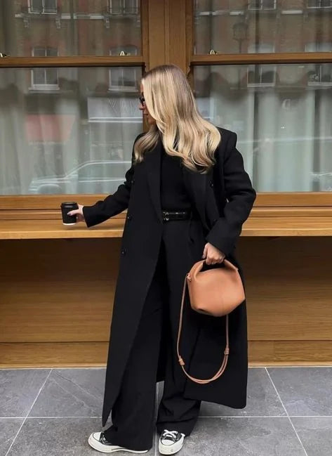 Klassieke dames trenchcoat met lange snit en tijdloze uitstraling