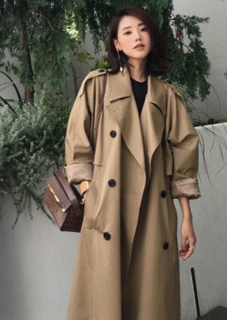 Dames trenchcoat in beige met soepele val en gestructureerde stof