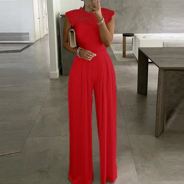 Feestelijke dames jumpsuit met wijde pijpen en kantafwerking aan de mouwen