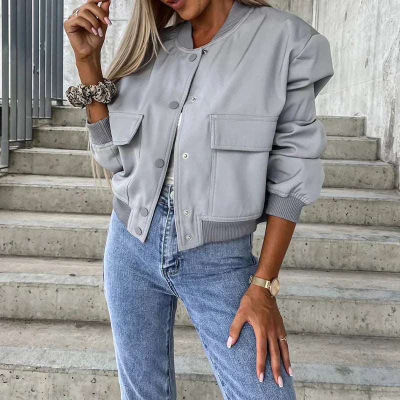 Achterkant beige bomber jas met elastische zoom en gladde geweven stof