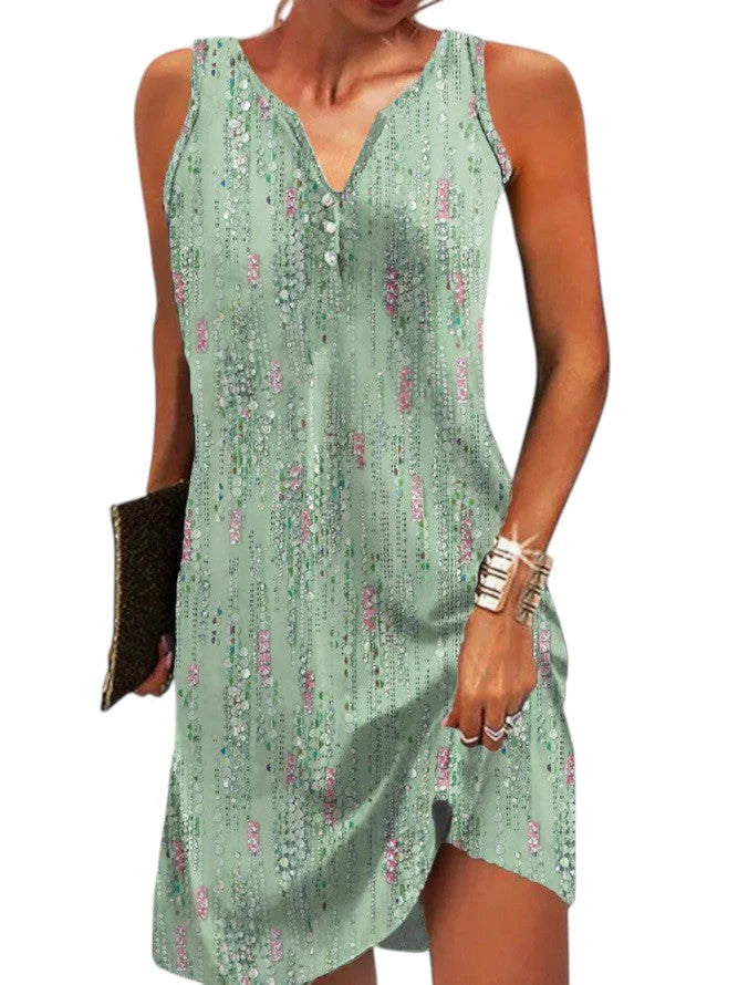 Mouwloze jurk met bloemenprint en knoopdetail aan de hals