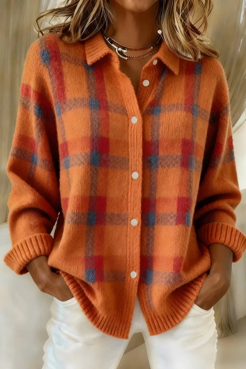 Dames geruit gebreid vest in oranje tinten met knoopsluiting en ribboord manchetten