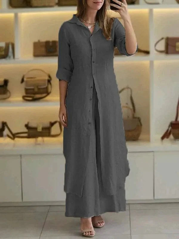 Detail van maxi blousejurk met klassieke kraag en oprolbare mouwen in natuurlijke kleur