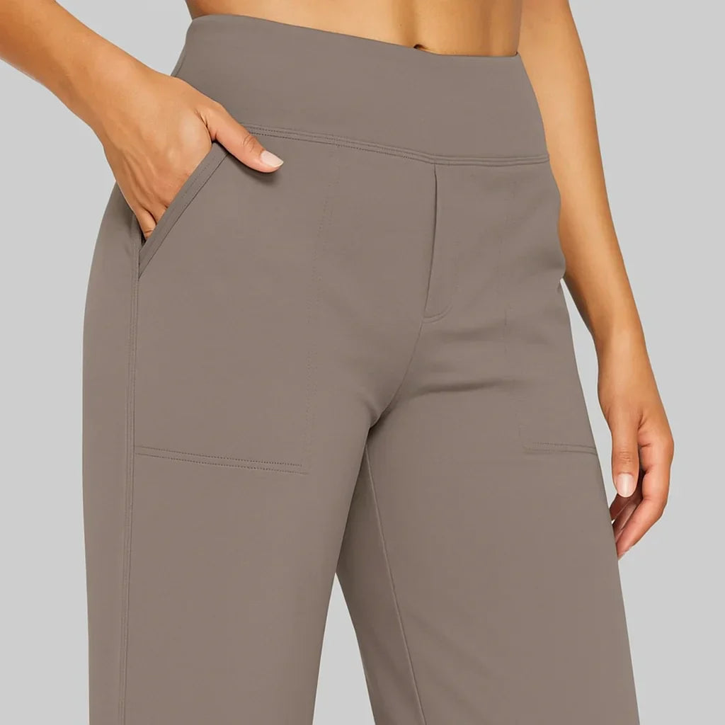 Dames flared stretchbroek hoge taille detail van brede elastische tailleband en zachte stof