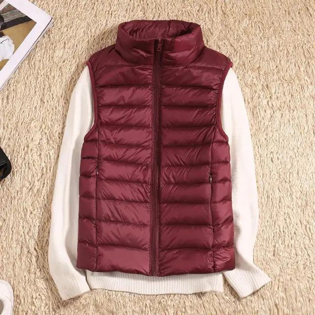 Mouwloze paarse bodywarmer met getailleerde pasvorm en zachte gewatteerde stof voor dagelijks dragen