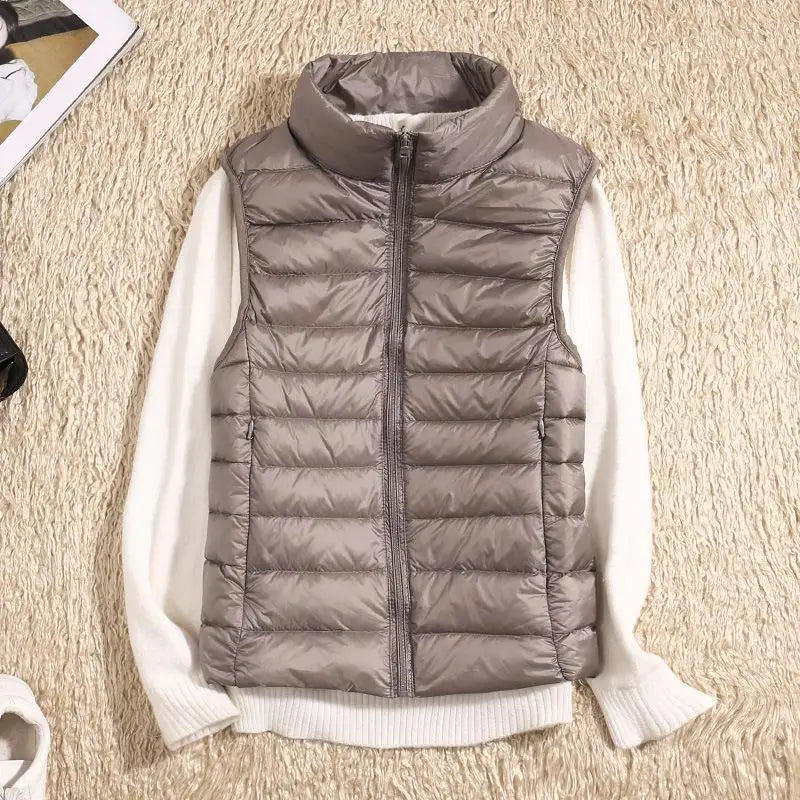 Dames bodywarmer in paars met volledige ritssluiting en compacte lichtgewicht constructie