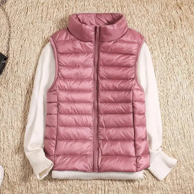 Dames bodywarmer in paars met horizontale stiklijnen en getailleerde pasvorm voor bewegingsvrijheid