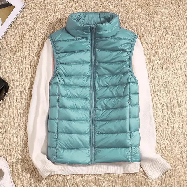 Getailleerde dames bodywarmer in paars met compacte pasvorm en zachte gewatteerde afwerking