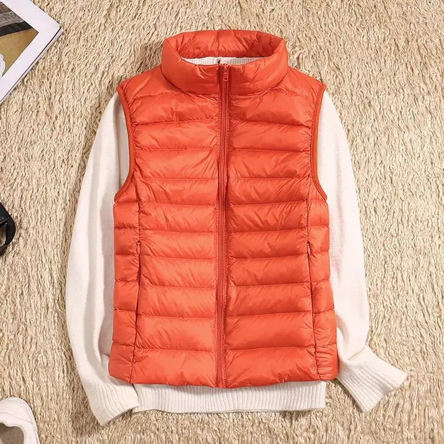 Gewatteerde mouwloze bodywarmer in paars met staande kraag en veelzijdige combinatiemogelijkheden